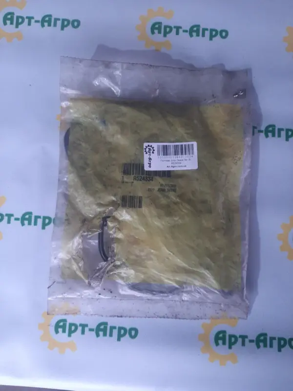 R524334 Gasket for the timing cover John Deere
